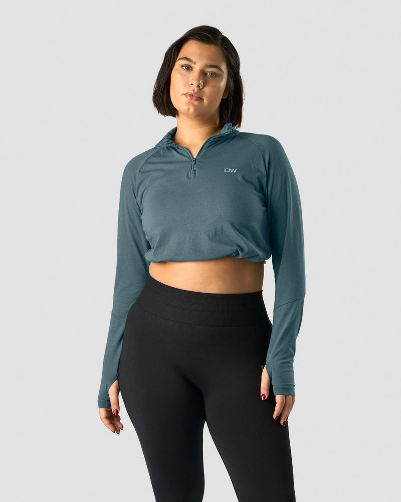 define cropped 1/4 zip adjustable jungle green