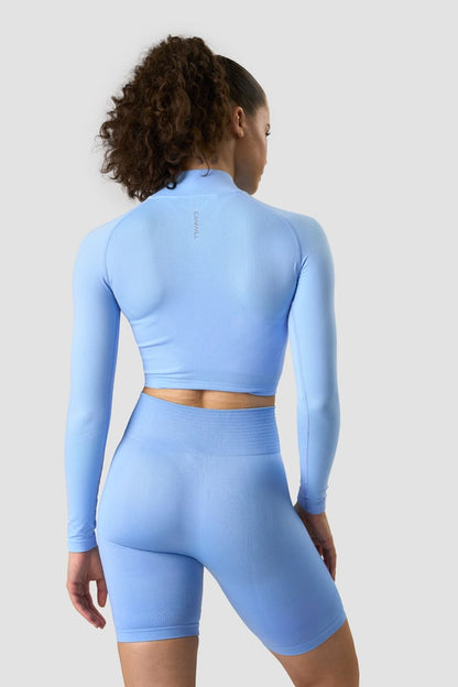 define cropped 1/4 zip daisy blue