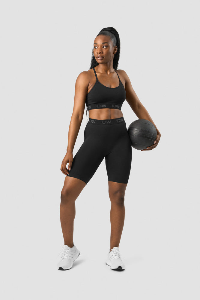 define seamless logo strappy sports bra black