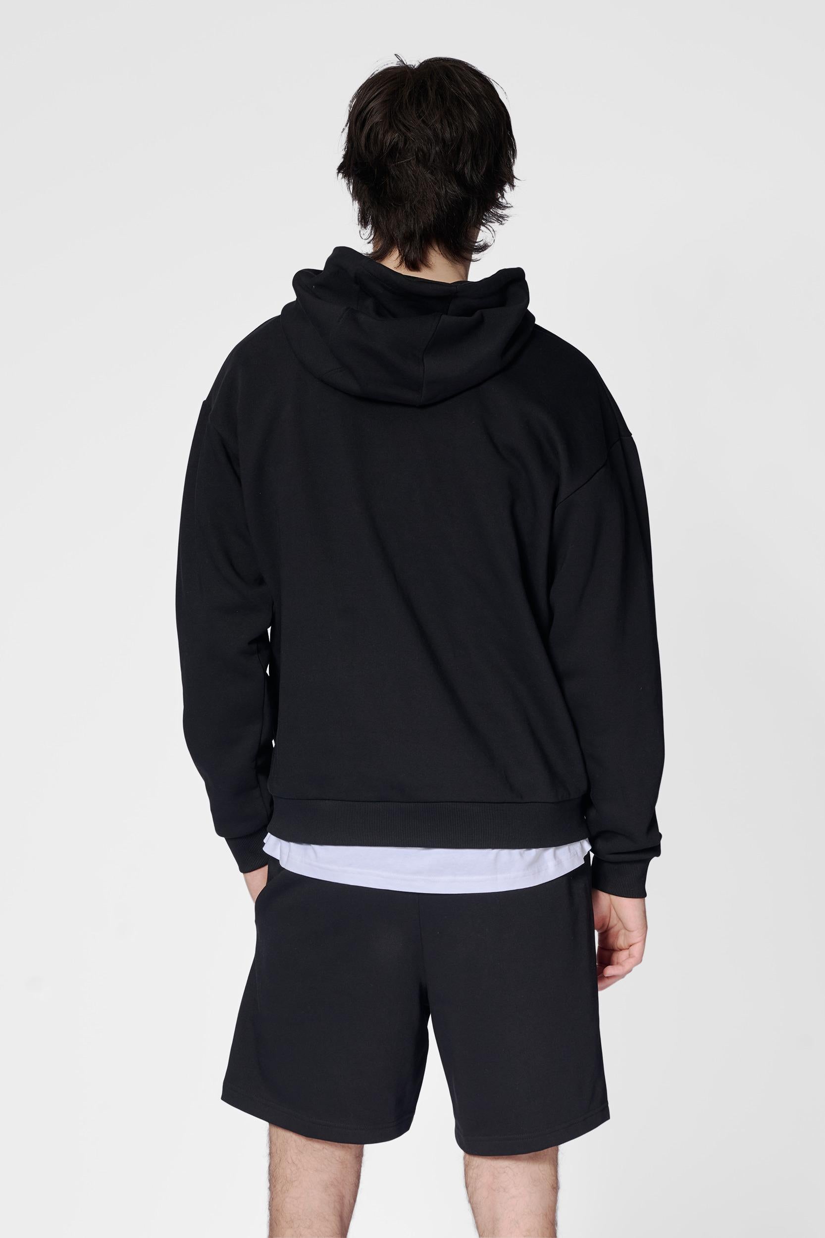 HUMMEL - Hmlloose Hoodie Sportswear - Black